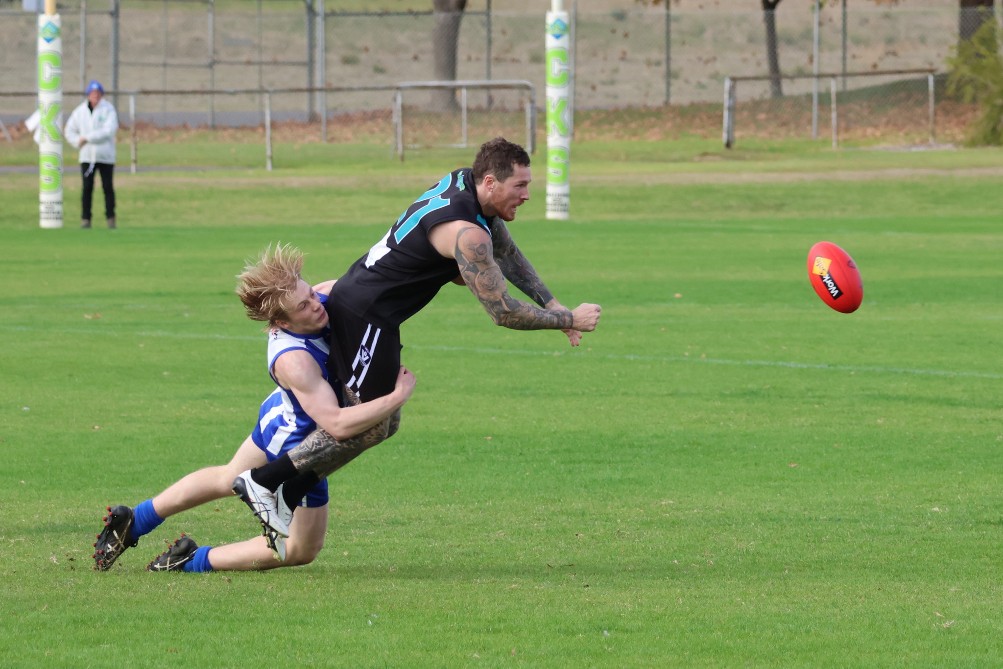Swifts’ Ryan Folkes gets a handball out. PHOTO: TRISH RALPH