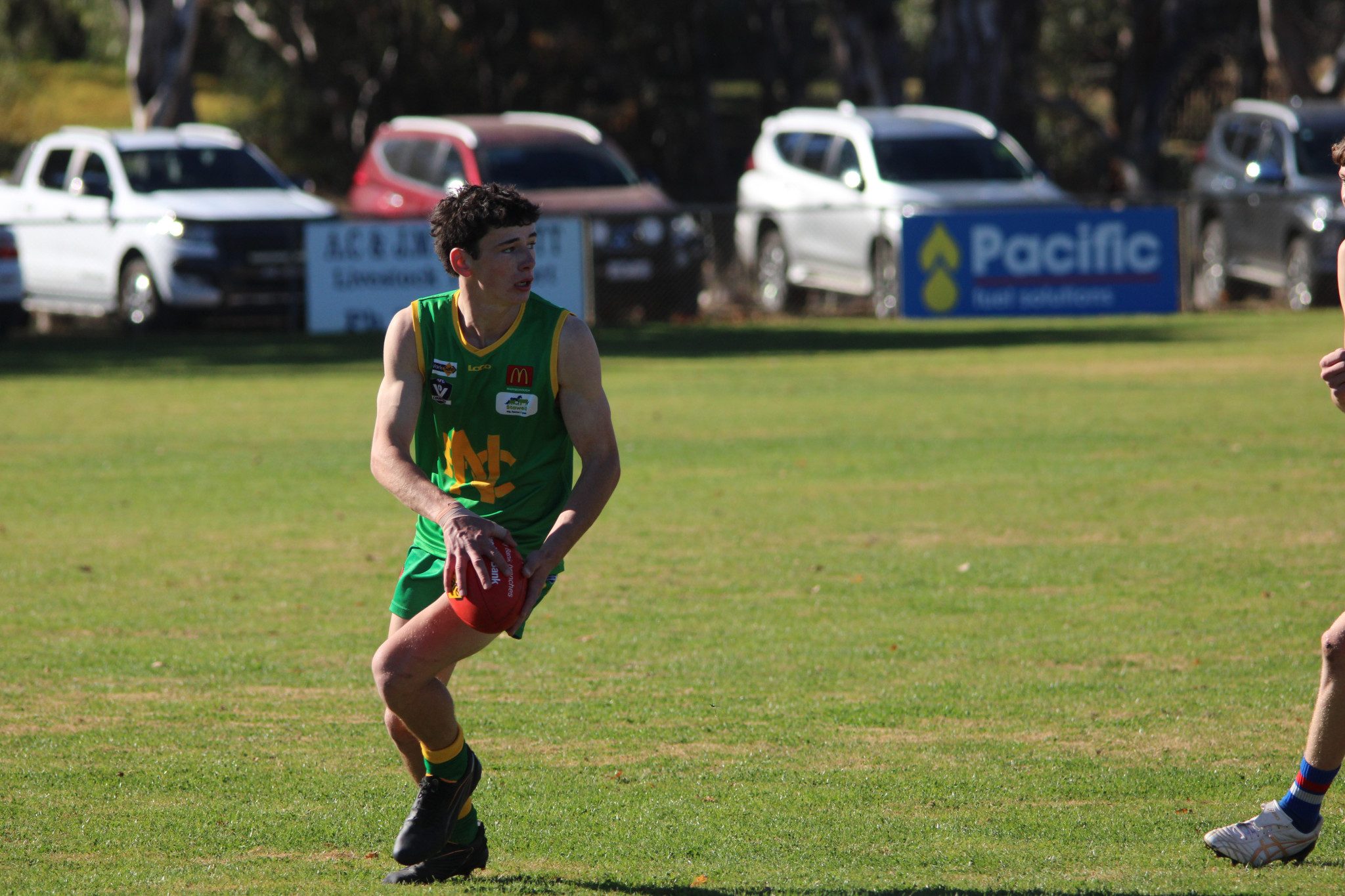 Grasshoppers’ Will Moloney prepares to kick forward. PHOTO: CHRIS GRAETZ