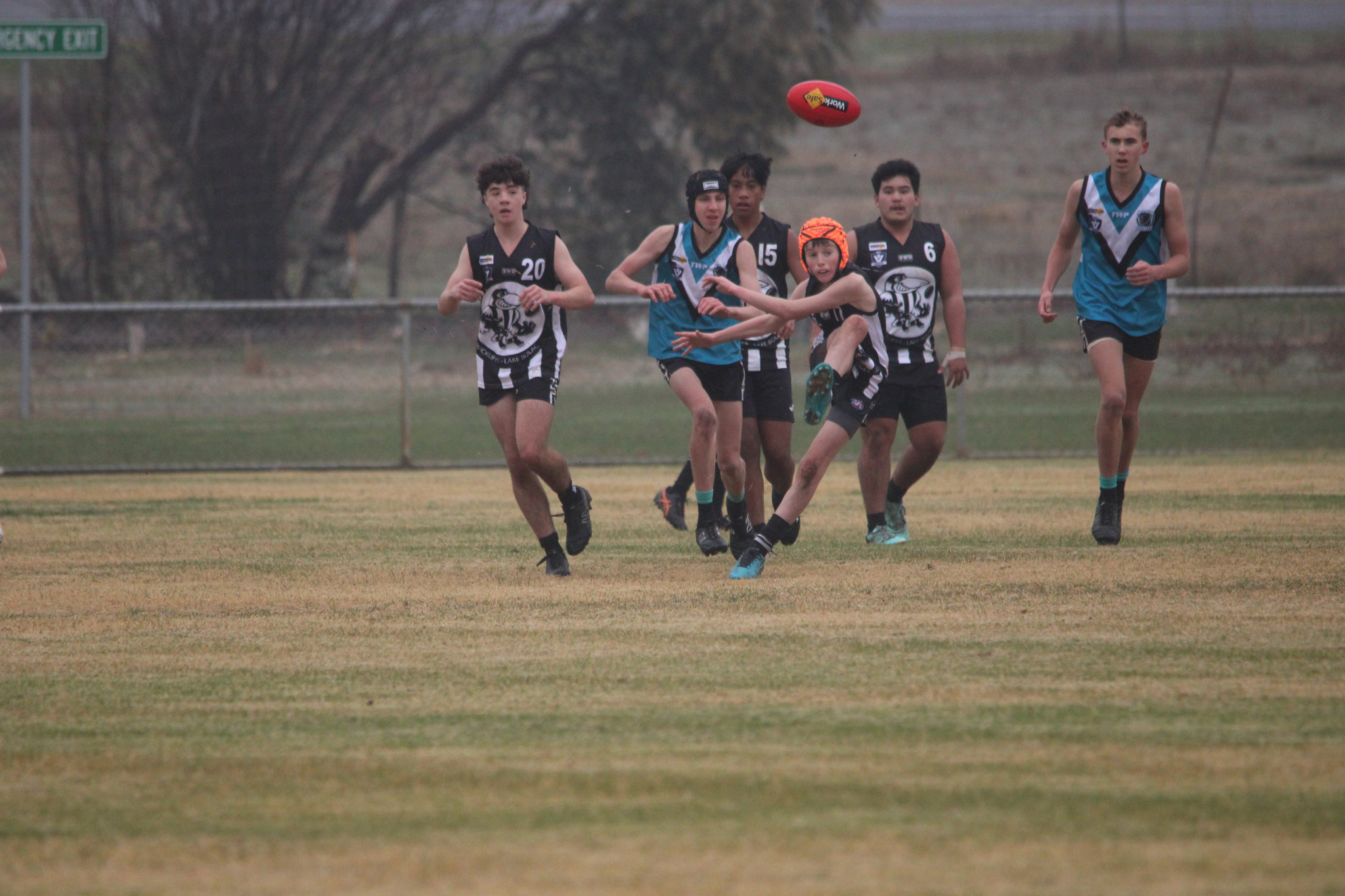 Charlie Thom (Magpies) clears the ball away from a pack. PHOTO: CHRIS GRAETZ