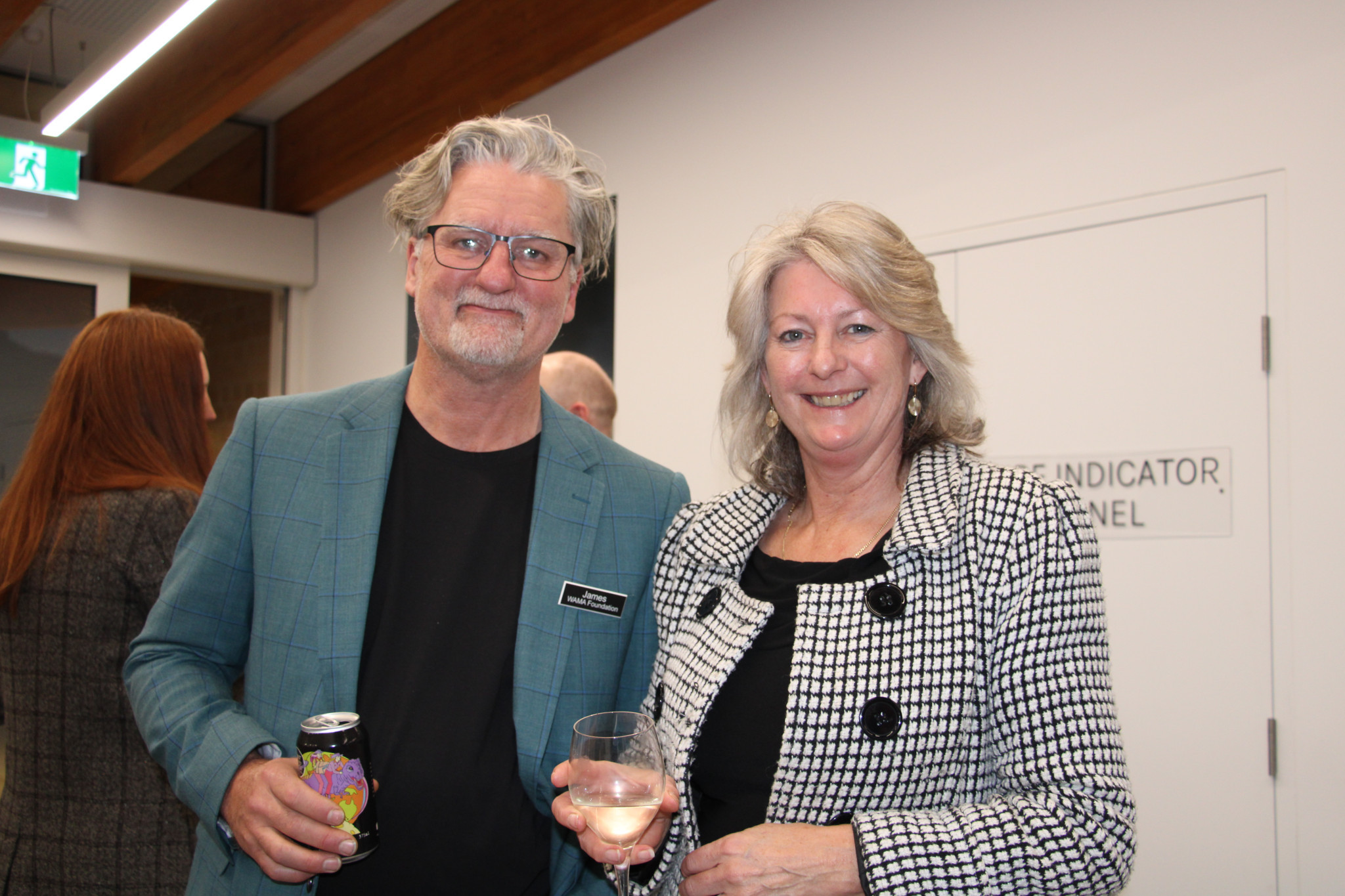 Gallery Assistant James Laidlear joins Mayor Karen Hyslop.