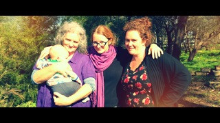 Jill with daughters Nadi and Kristy and Grandson, Quinn.