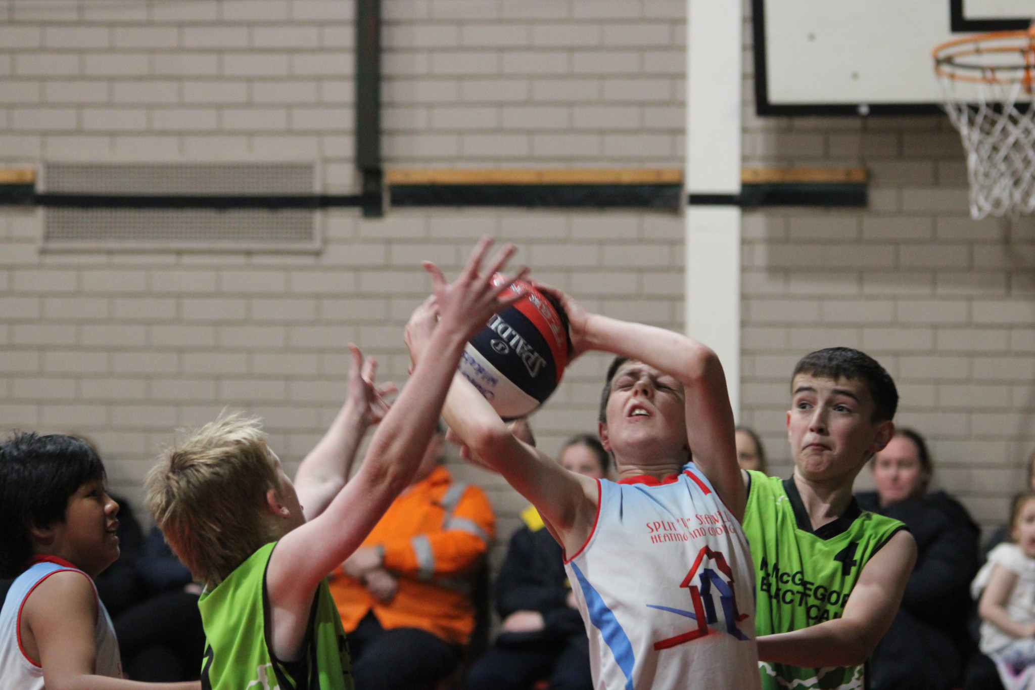Sam Margetson (SS) goes for a shot pressured by Jack McGregor and Kaeden Beaton. PHOTO: CHRIS GRAETZ