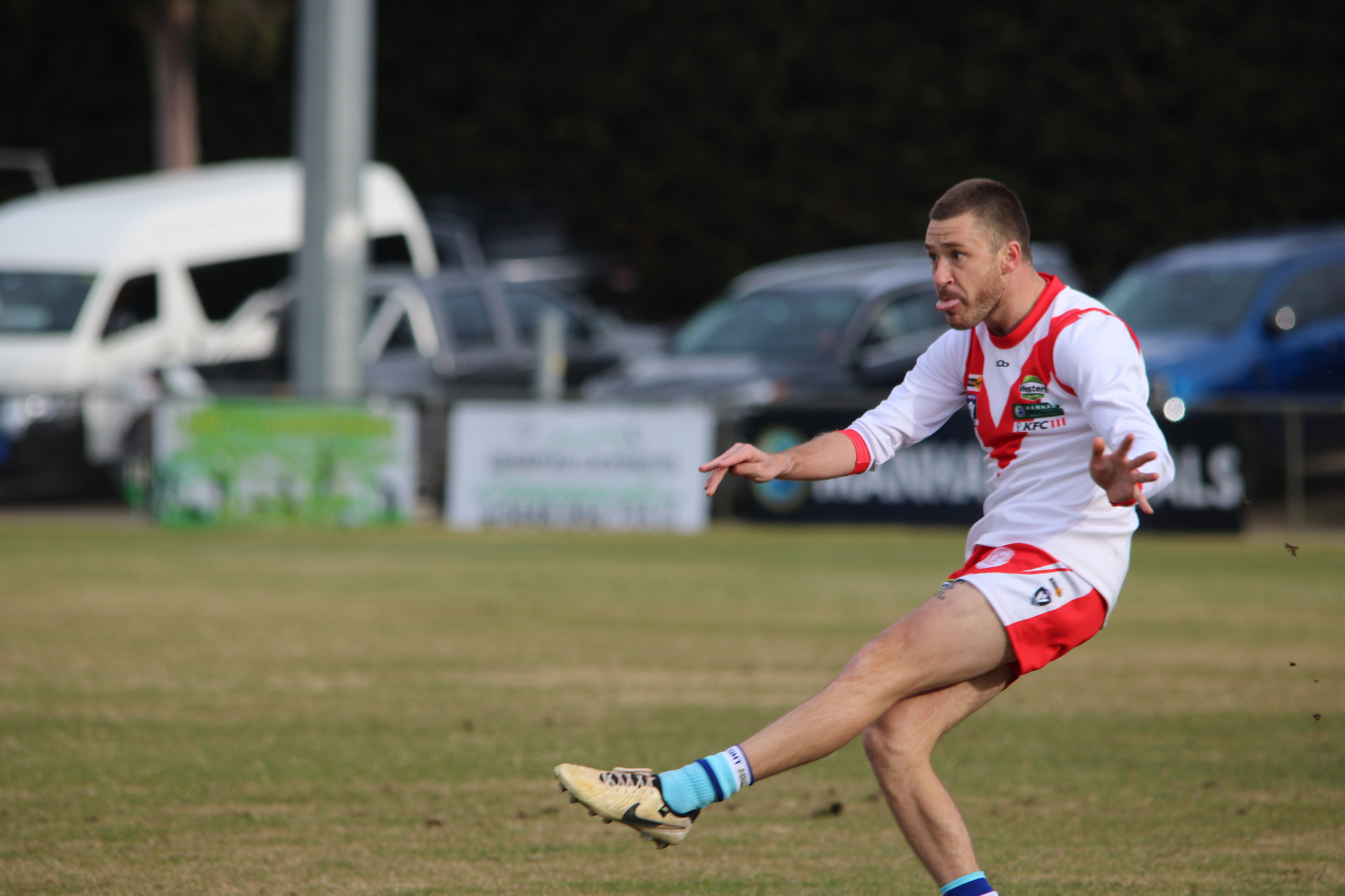 Jacob Bates (Rats) kicks the ball to the centre-half-forward from the wing. He was one of the best six players on the ground. PHOTO: CHRIS GRAETZ