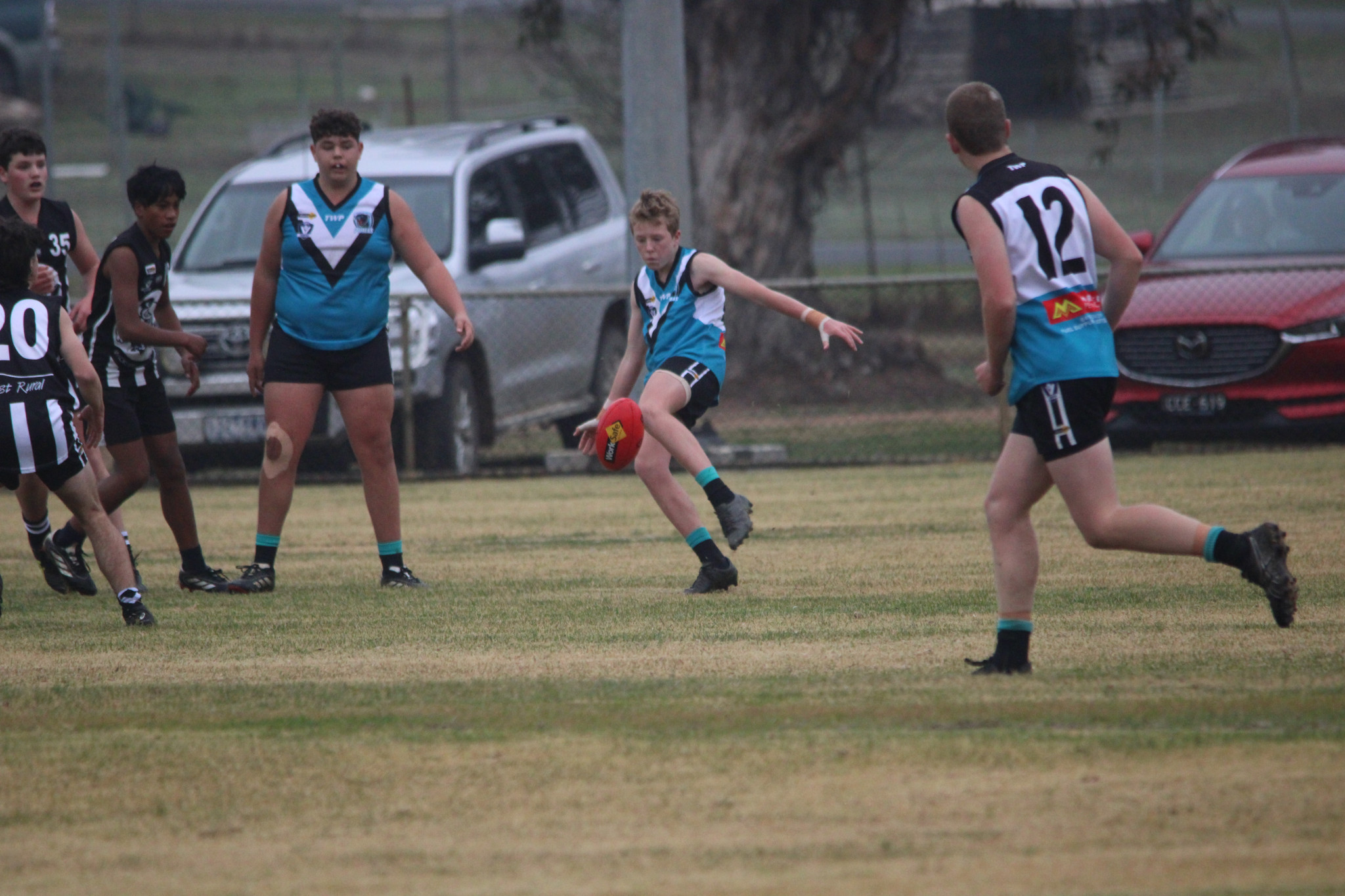 Ned Jackson (Pumas) sweeps around to kick one of his five goals for the day. PHOTO: CHRIS GRAETZ