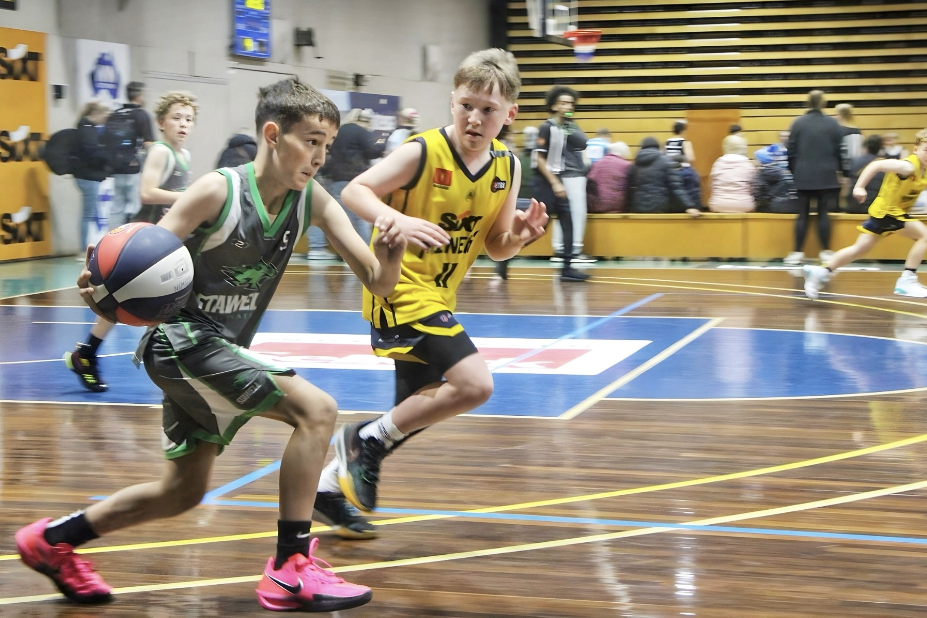 Wildcats' Jack McGregor dribbles down court. PHOTOS: KAYLA MCGREGOR