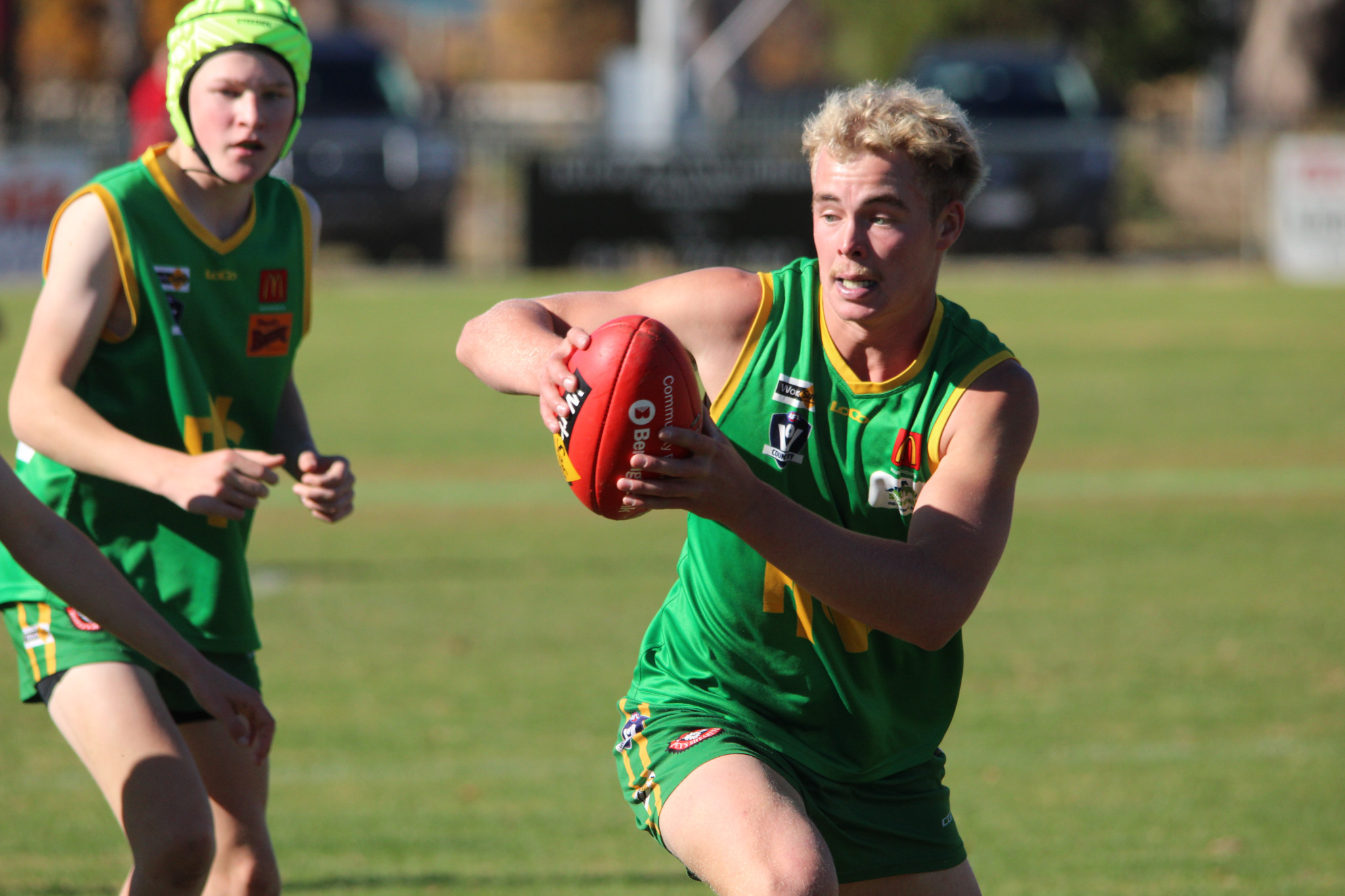 Grasshoppers' Jacob Martin bursts from a pack. PHOTO: CHRIS GRAETZ