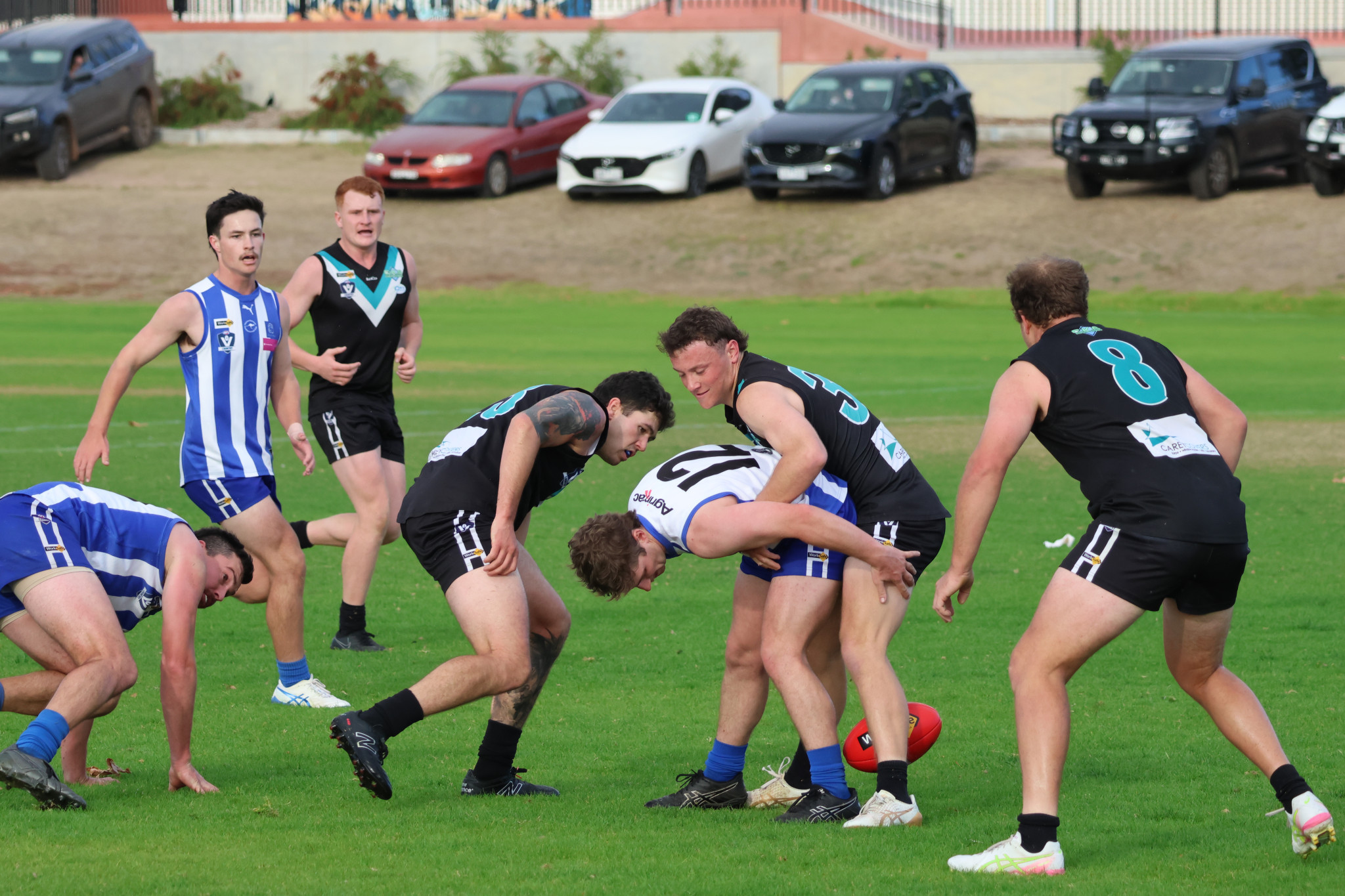 Swifts' Brodie Kindred lays a tackle with Macka Padley in support and Joseph Martin watching on. PHOTO: TRISH RALPH