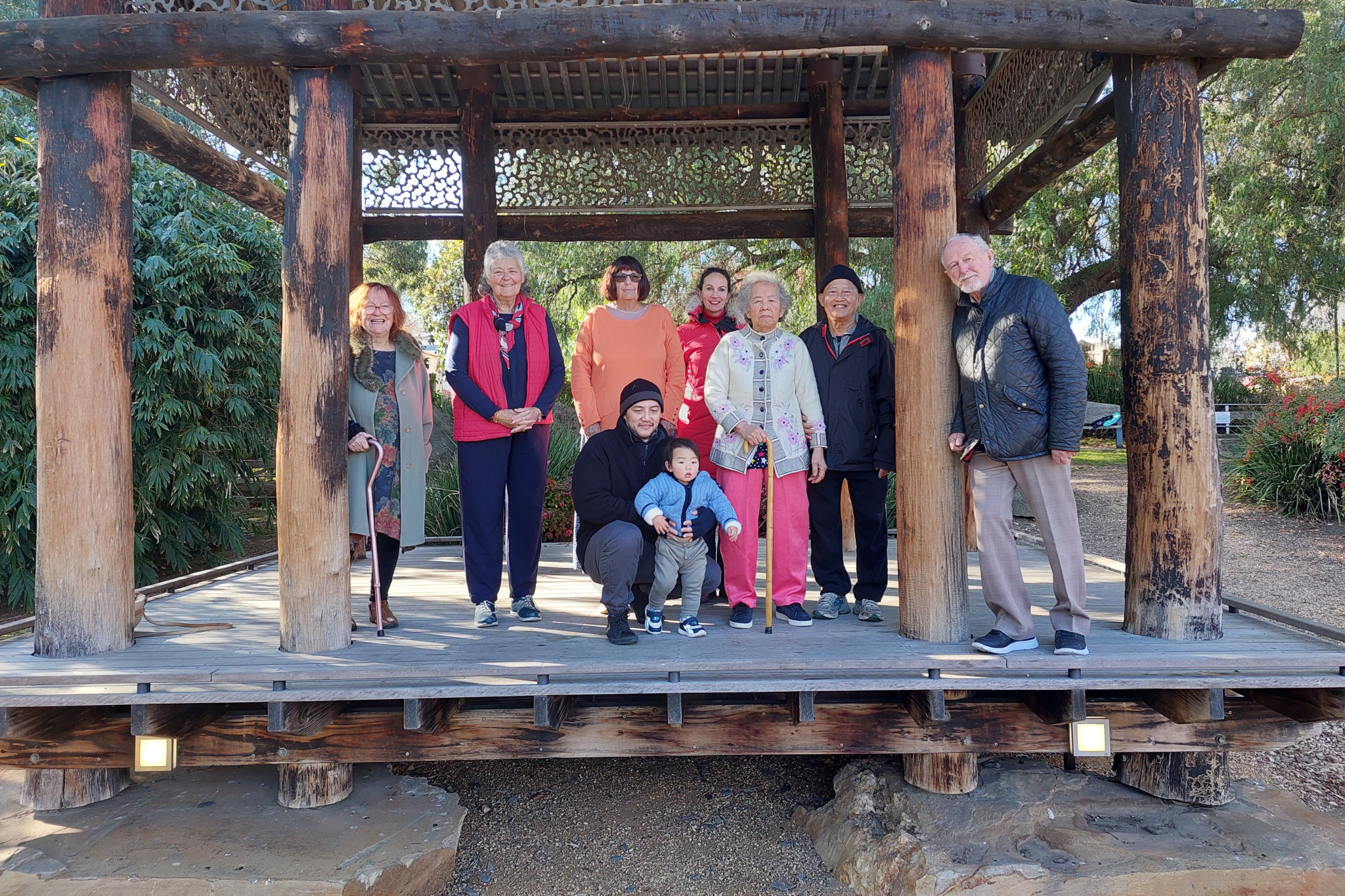 Members of the Chinese Garden committee met with the Low family on Sunday. Pictured are (back row) Glenys Allen, Marg Pilgrim, Deb Hicks, Jane Howe (past President), Moi Wong, Soon Low, Chinese Garden President John Quinn and (front row) Kung Low and son Chinguun.