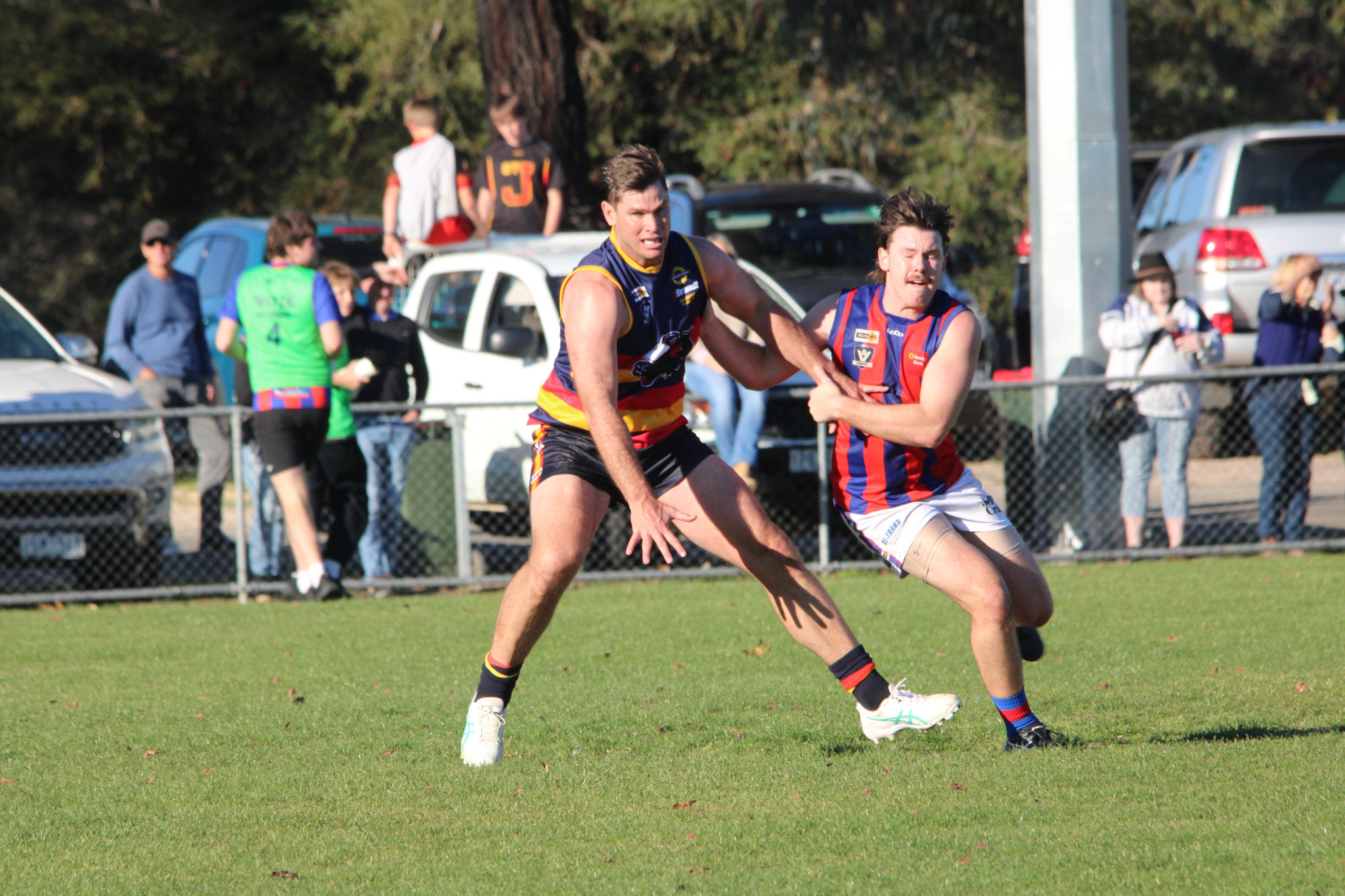 Tom Hawkins tries to break away from his opponent. PHOTO: CHRIS GRAETZ
