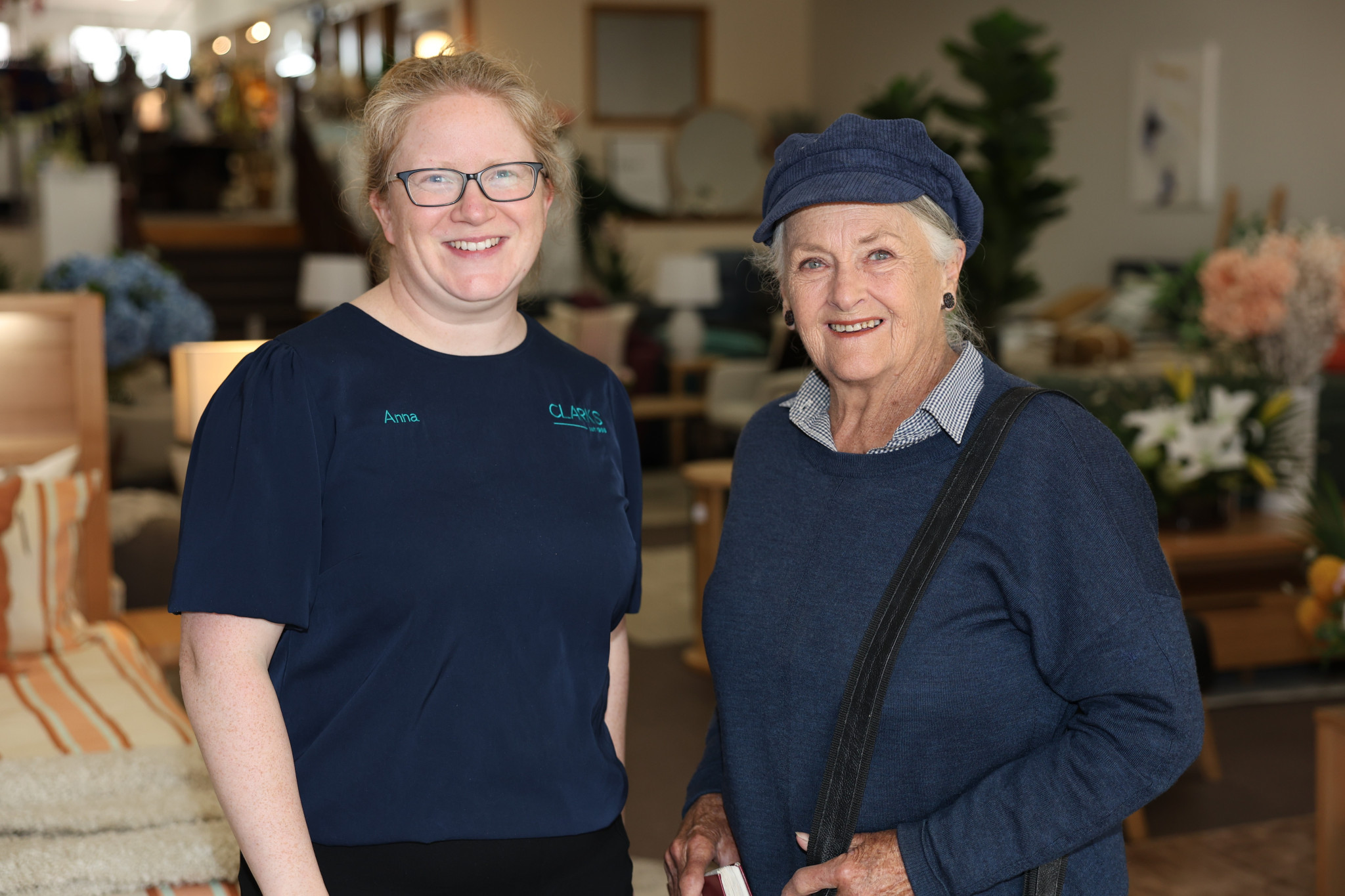 Anna Clark (left) and Stawell Y-Zetts founder Meg Blake catch up at Clarks Furniture on Wednesday as the November Shopping Spree draws closer.
