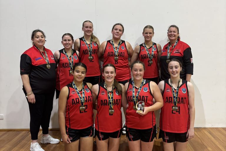 Ararat Redbacks Under 18 girls champions (Back from left) Coach Casanda Woods, Mackenzie Johnson, Bridie Price, Lily Moncrieff, Ruby Thomas, team manager Ros Thomas, (Front from left) Violet Day, Addison Lardner, Nevani Woods, Mia Gardiner. PHOTO: Tammi Munro