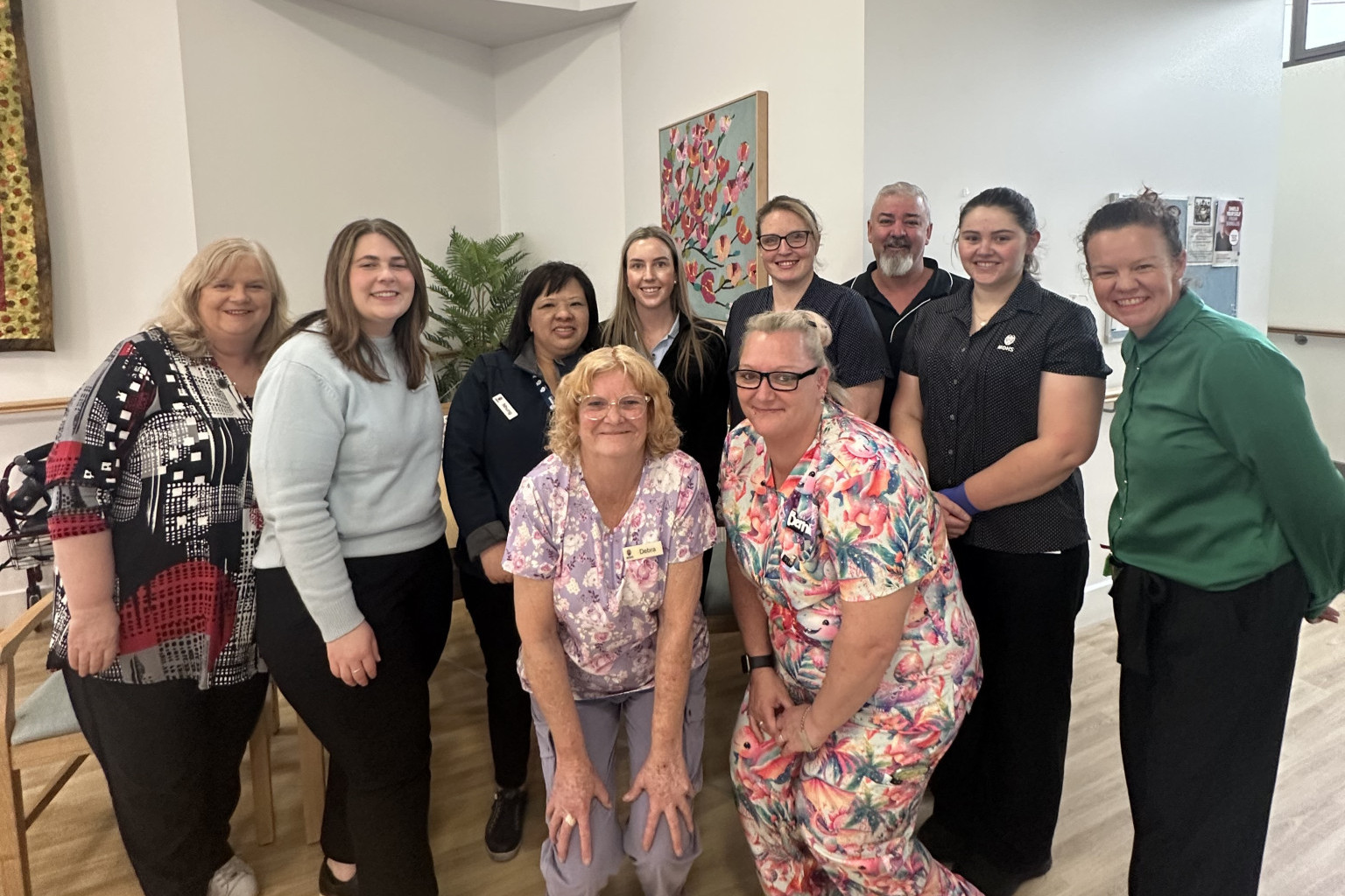 Debbie Rogers, Maddy Jeffery, Nhung Sanders, Toni Bastin, Amanda Foster, Phil Staynes, Kirsten Bannan, Nickola Allan, centre left to right Debra Mohr, Bernie Roberston, celebrating Aged Care Employee Day.
