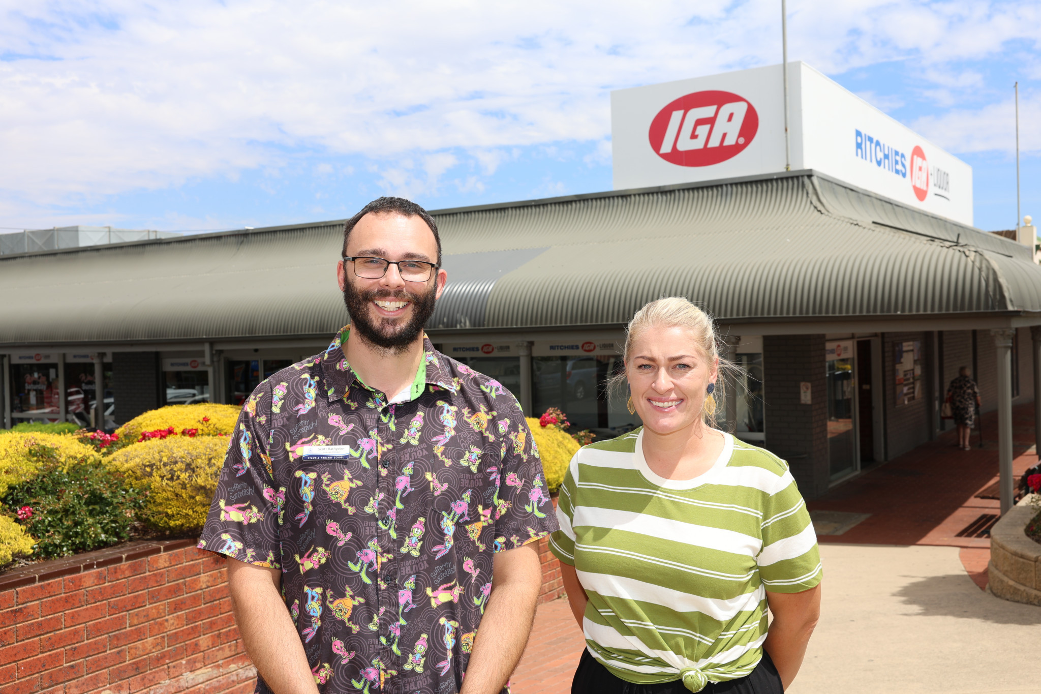 Stawell Primary School acting principal Scott Rathgaber (left) and acting assistant principal Tayla Greene at Ritchies IGA Stawell, where local shopping is helping fund community programs. Photo by Henry Dalkin.