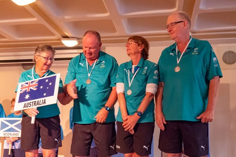 Chris Young with his mixed fours team that won silver against Scotland.