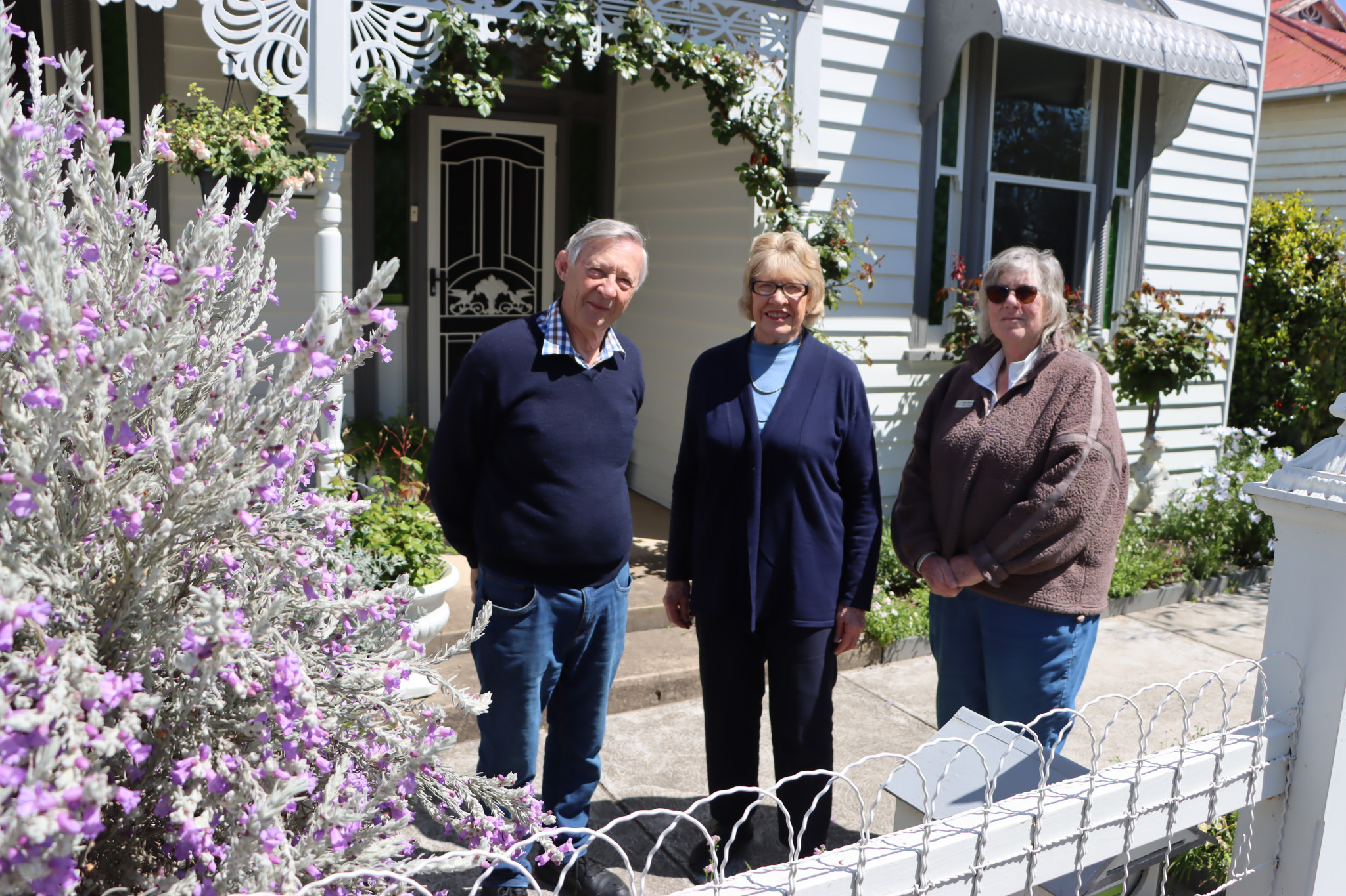 Allan and Ferelise Bonollo met up with Ararat Retirement Village Ladies Auxiliary President Helen Boling this week to show off their Viewpoint Street garden. Photo by Craig Wilson.