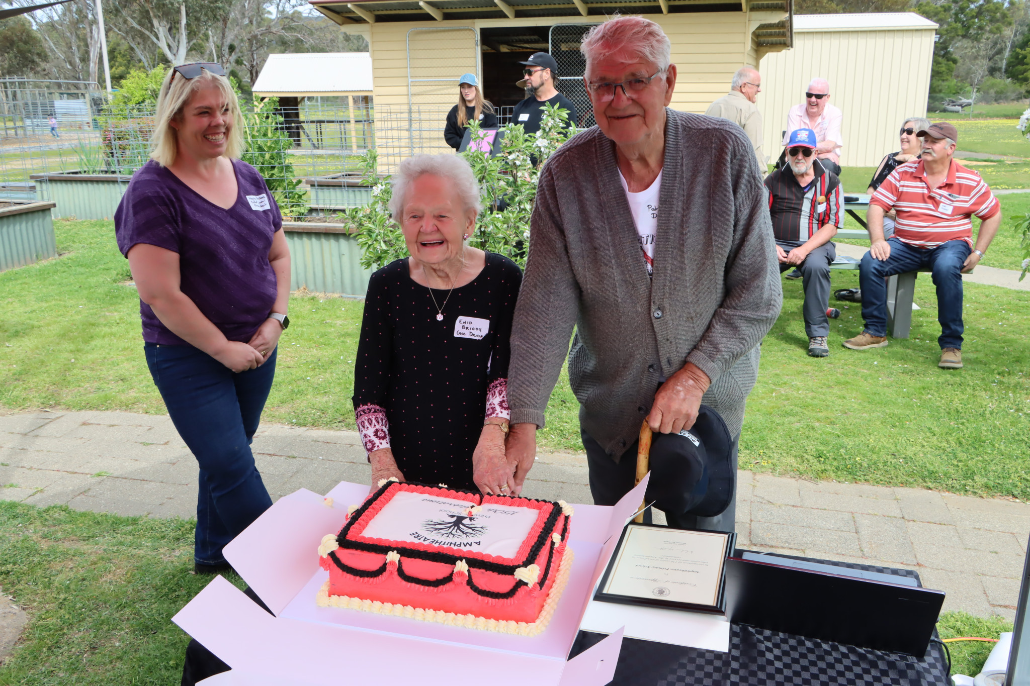 Two of Amphitheatre Primary School’s oldest students, brother and sister Enid Briody and Pat Dridan were asked to cut the celebratory cake.