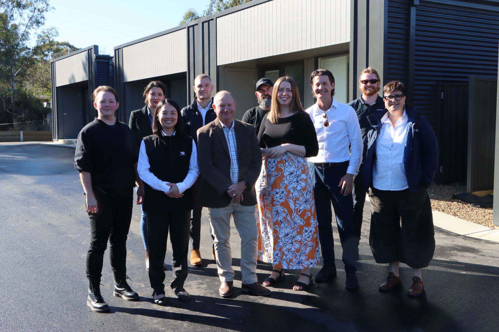 Carmen Mendrek (Homes Victoria, Phuong Au (Ararat Rural City Council), Timothy Briggs, Cr Bob Sanders (Deputy Mayor), Ben Hargraves (Ararat Kitchen and Joinery), Martha Haylett (Member for Ripon), Stuart Benjamin (Elmstone Group, Corey Heard (GJ Gardner) and Madeline Di Pietrantonio (Homes Vic) at the completion of 16 new units in Grano Street.