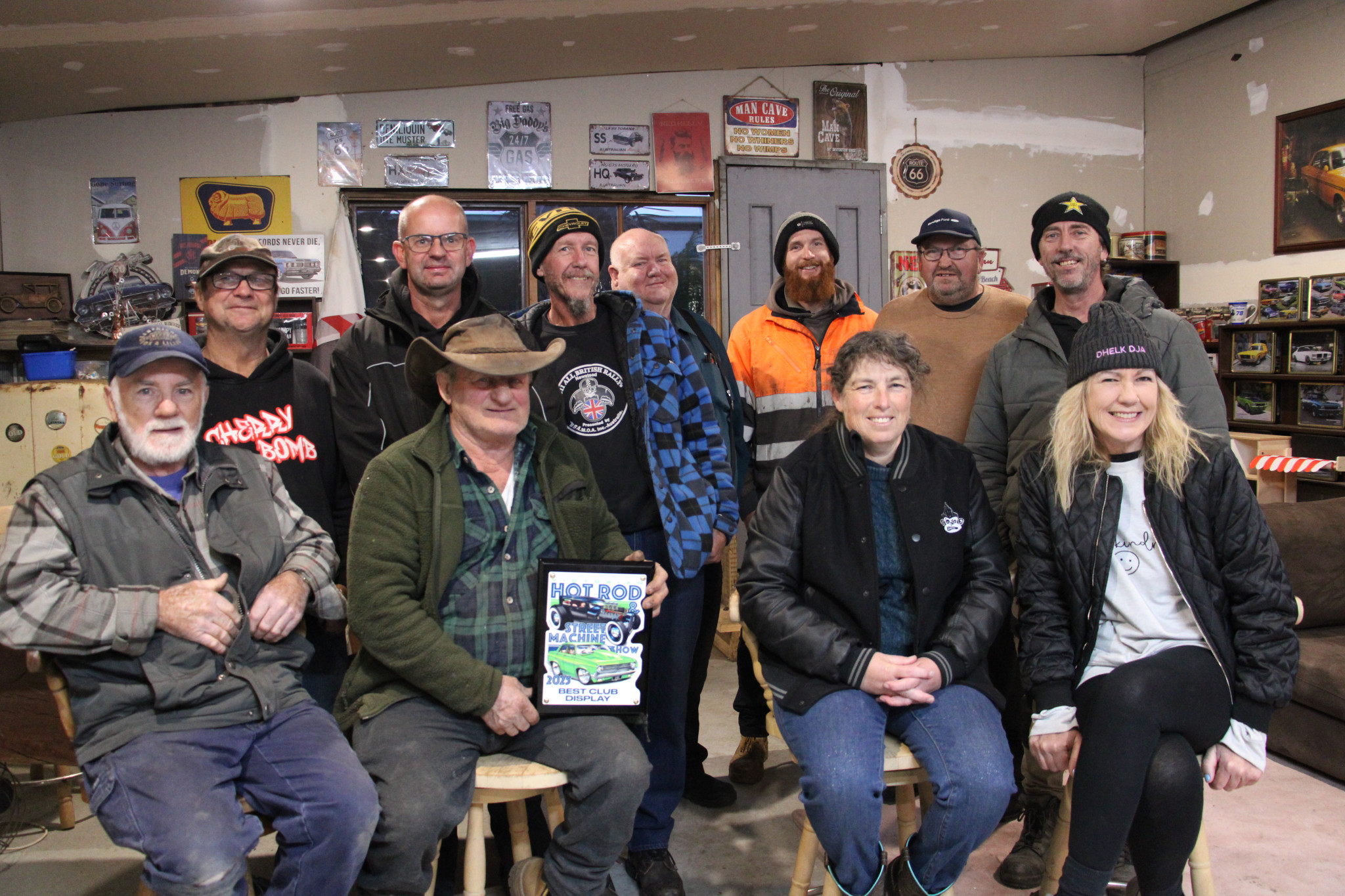 Grampians Grease Monkeys proudly show off their winning shield.