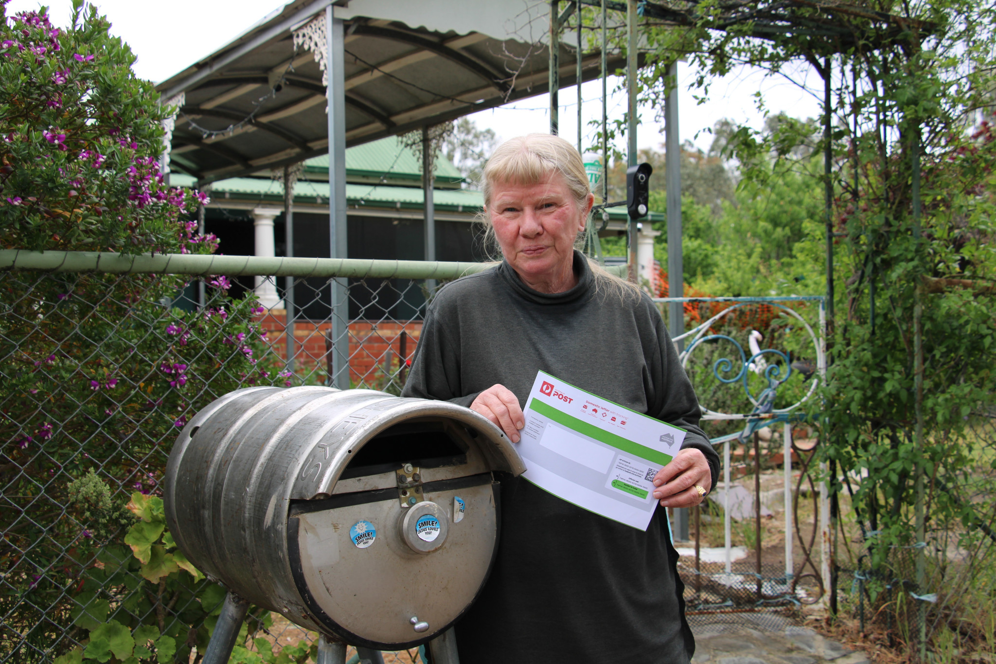 Locals like Angela Weber commend the local postie for achieving an impossible task.