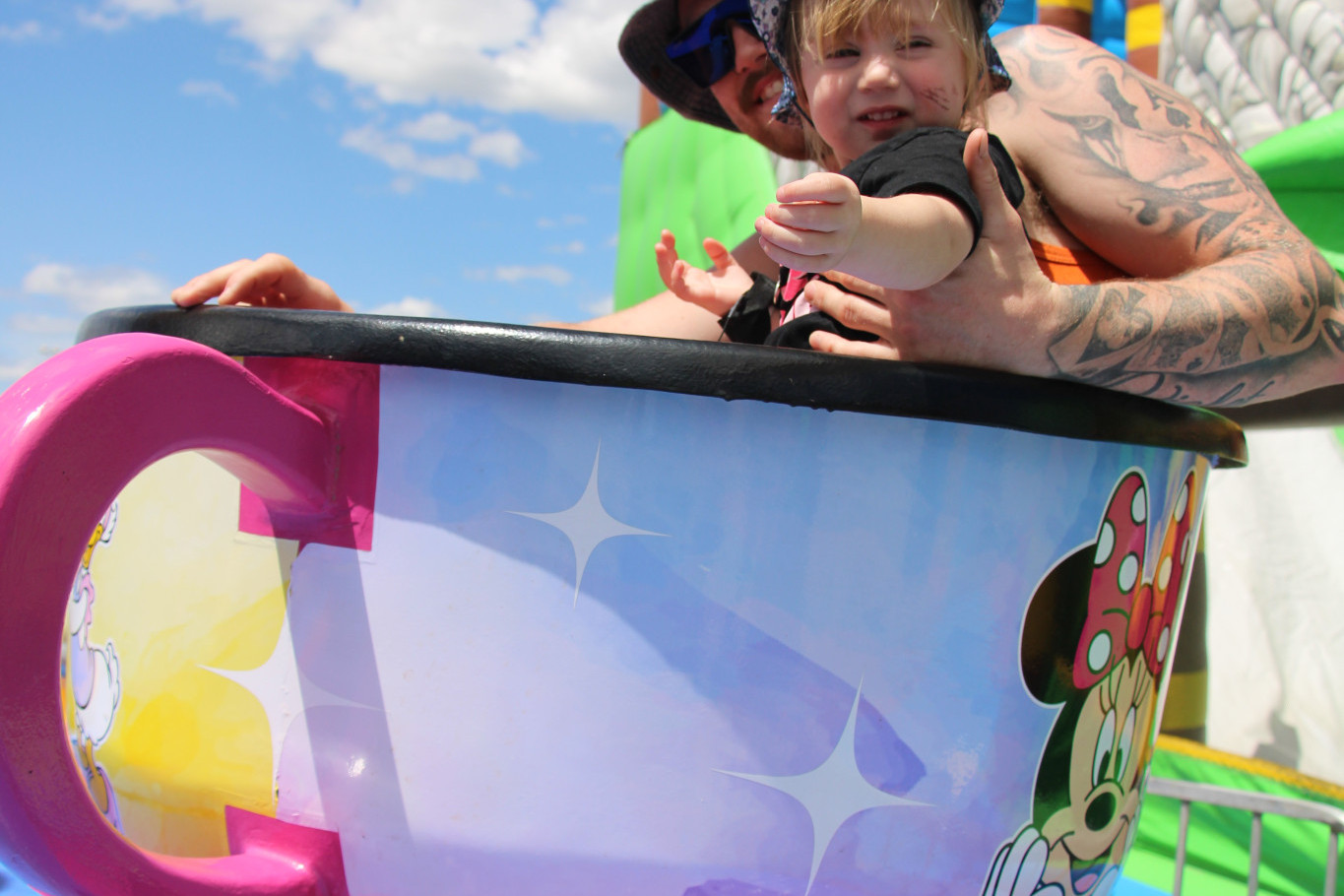 Violet and father Connor take to the teacups at last year's show.