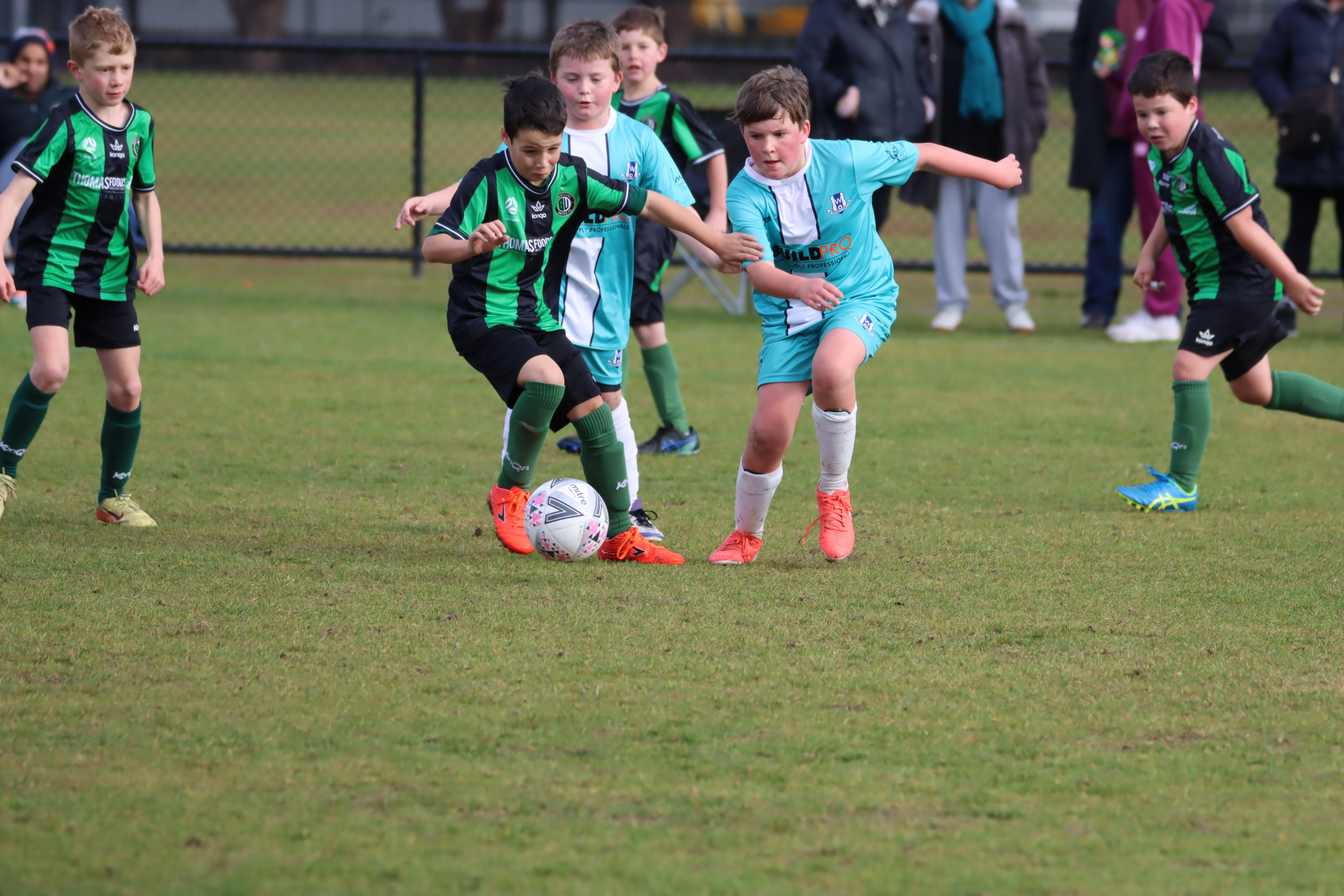 U10: Larry Holmes (Grampians) gets away from two opponents. PHOTO: CRAIG WILSON
