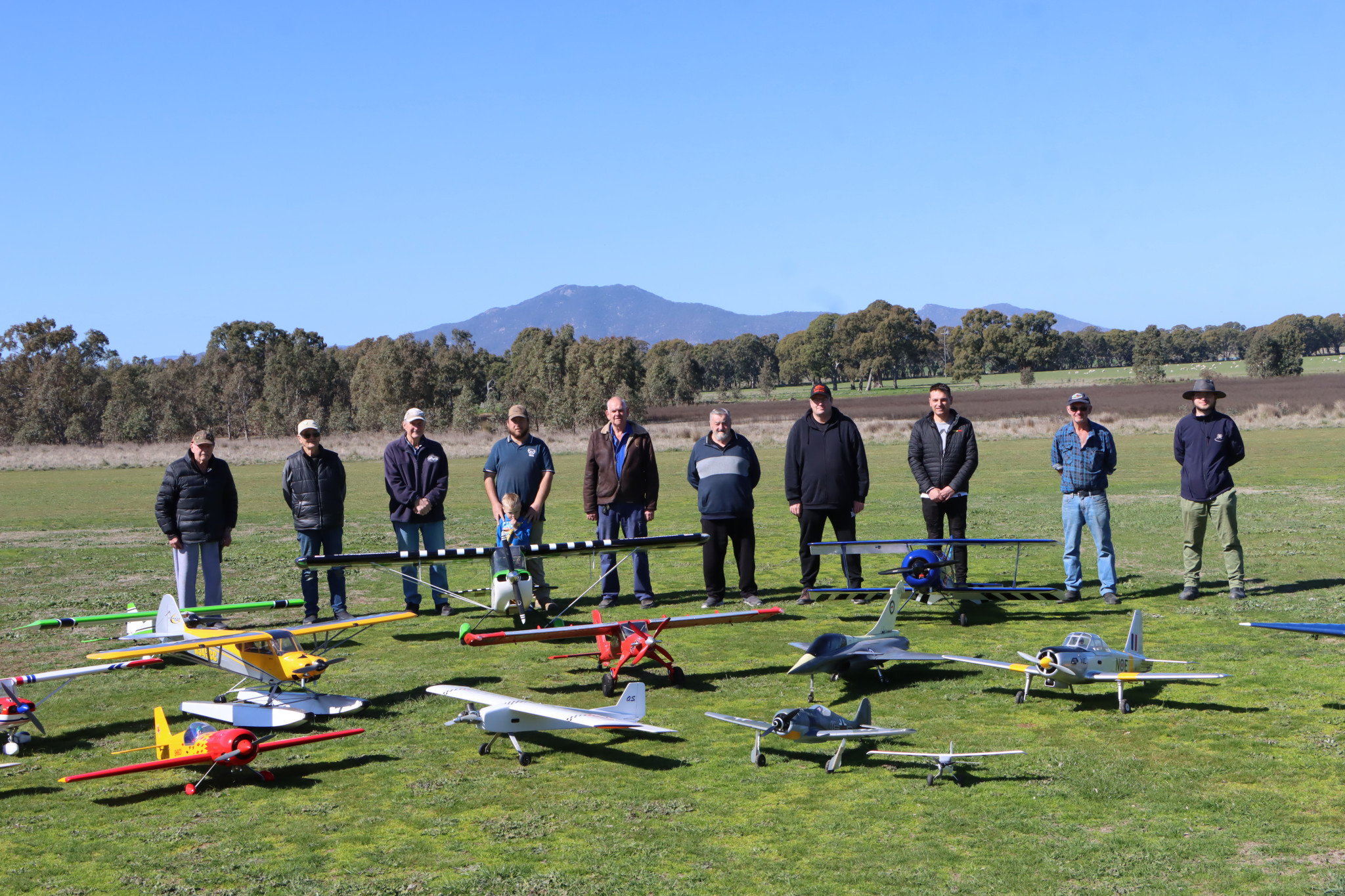 Club members were keen to show off their planes when the Advocate called by on Sunday. Pictured are Jeff Whatley, Robert Wilkins, Ken Sampson, Brodie and Tate Hunter, Rick Pimblot, John Trevalen, Lyle Trevalen, Jim Katsantonis, Paul Phillips and Jarred Moore at the clubs headquarters.