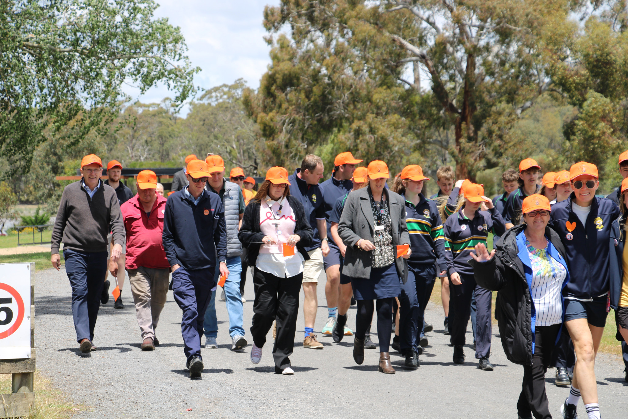 Local residents and students walk in solidarity.