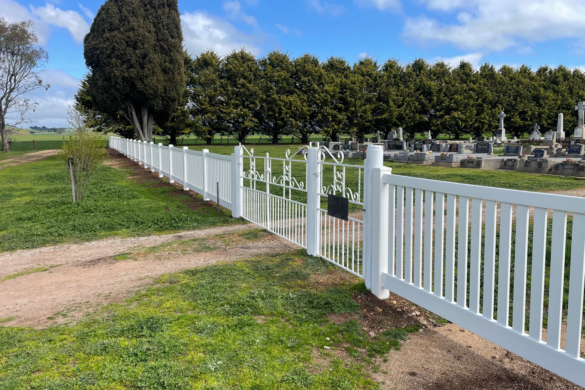 The gates complete with fresh powdercoating providing a welcome to the cemetery at Waubra. Photo by Luke Molloy.
