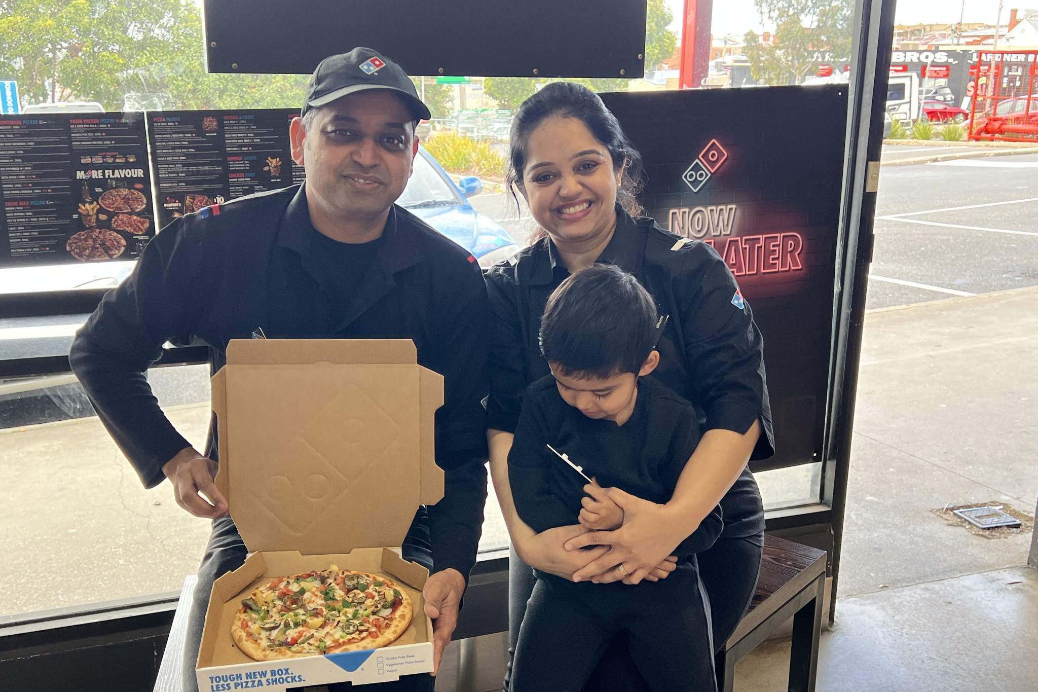 Niraj Makawana (Nick the Piza Guy) with his wife Bhumika Rajput Makawana and son in 2023.