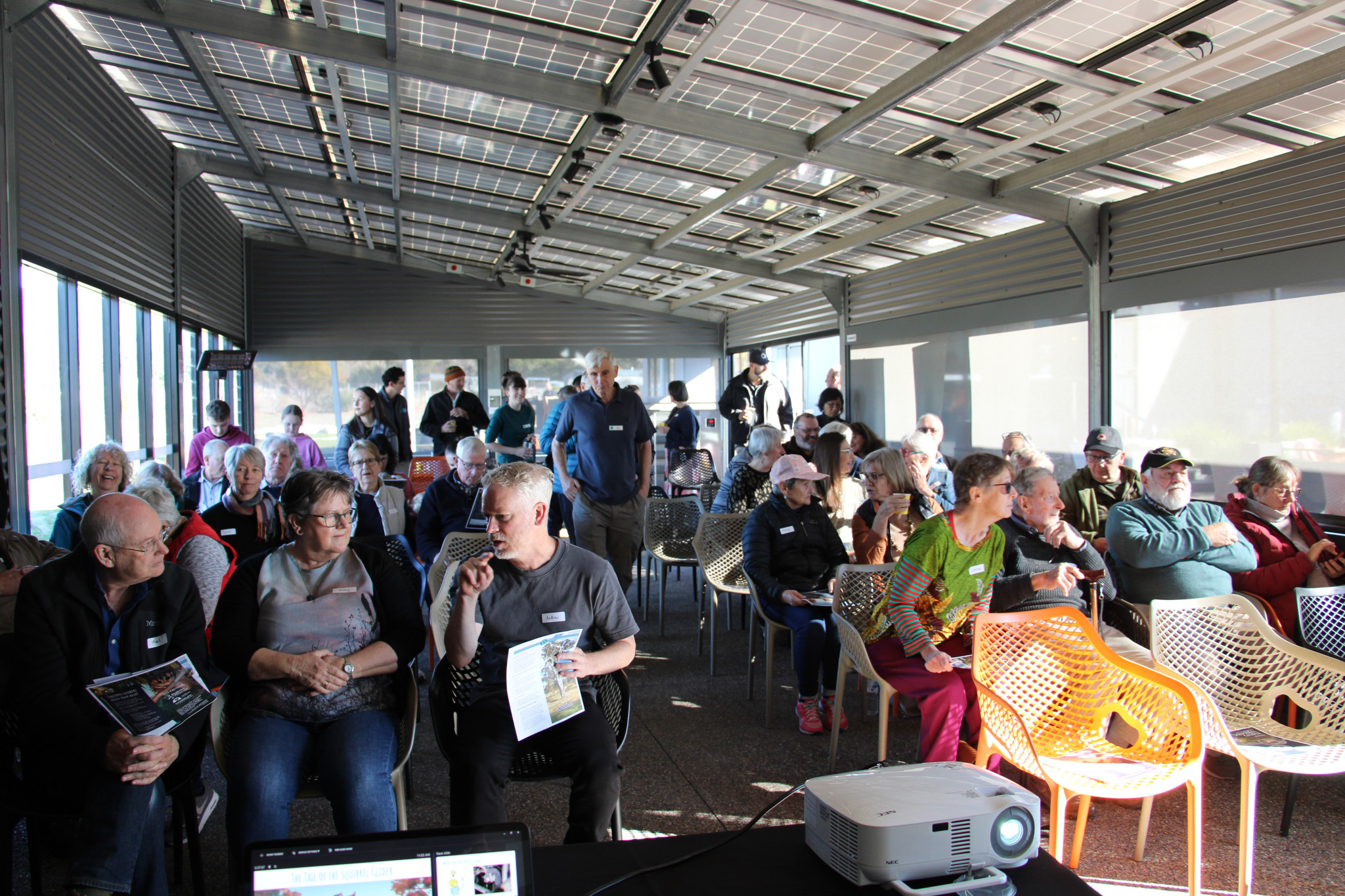 Volunteers and interested community members attend a talk to discuss how to help save the declining population of Squirrel Gliders.