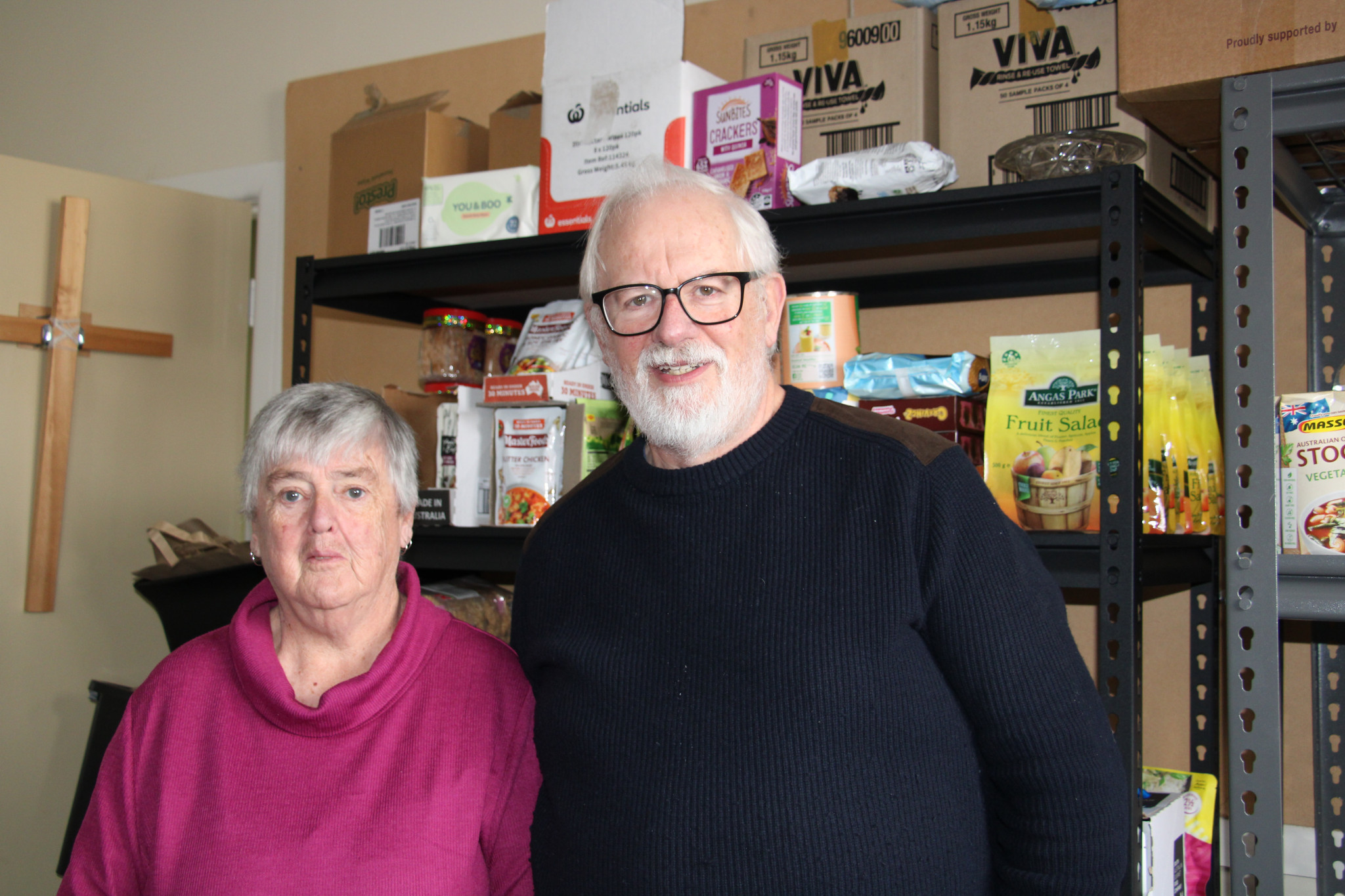 Noelle Forth and Dave Tolputt assist locals with food security.