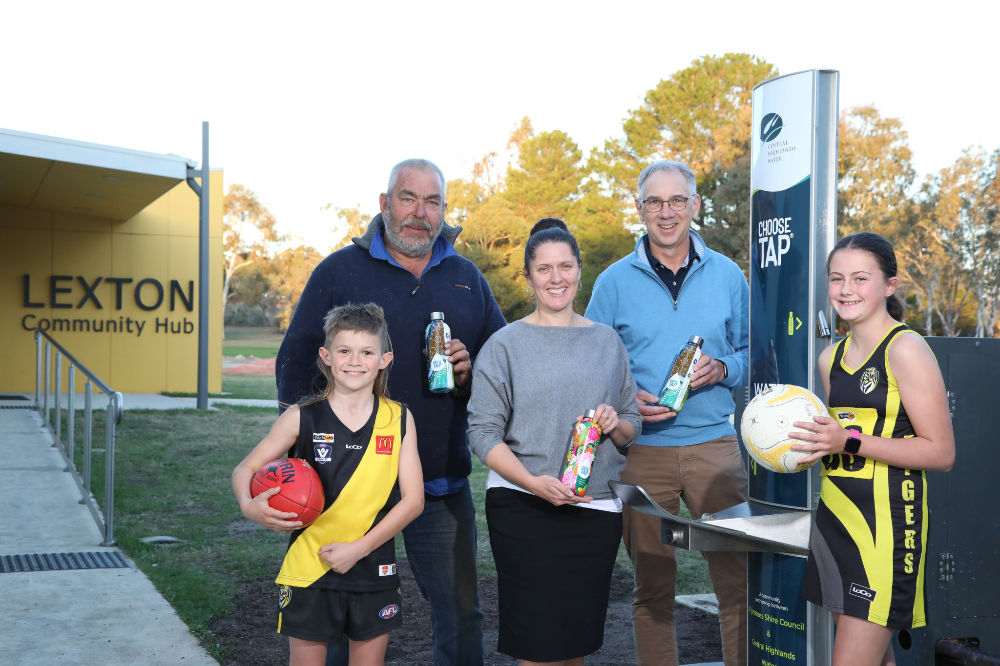 Cr Simon Tol, Mayor Tanya Kehoe and Central Highlands Water Managing Director Jeff Haydon were joined by Zanda Fisher and Marlie Briody from the Lexton Football Netball Club to launch the new drinking fountain.