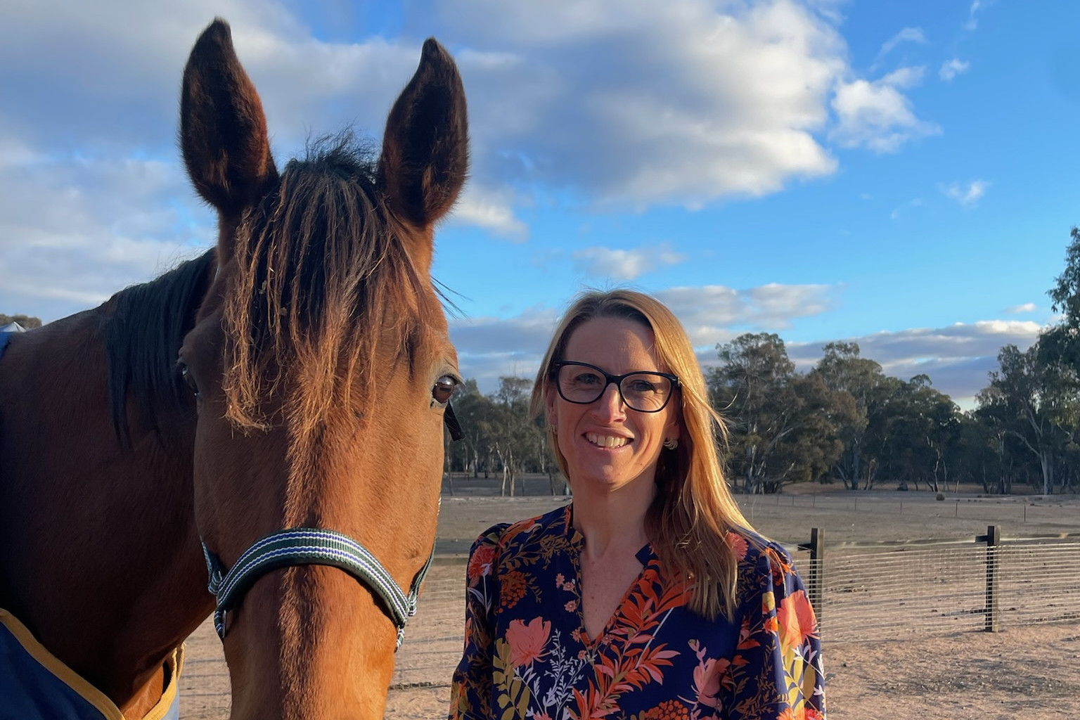 Newly-appointed club manager of the Avoca Shire Turf Club Lisa Evans, hanging out with her pal Alfie.