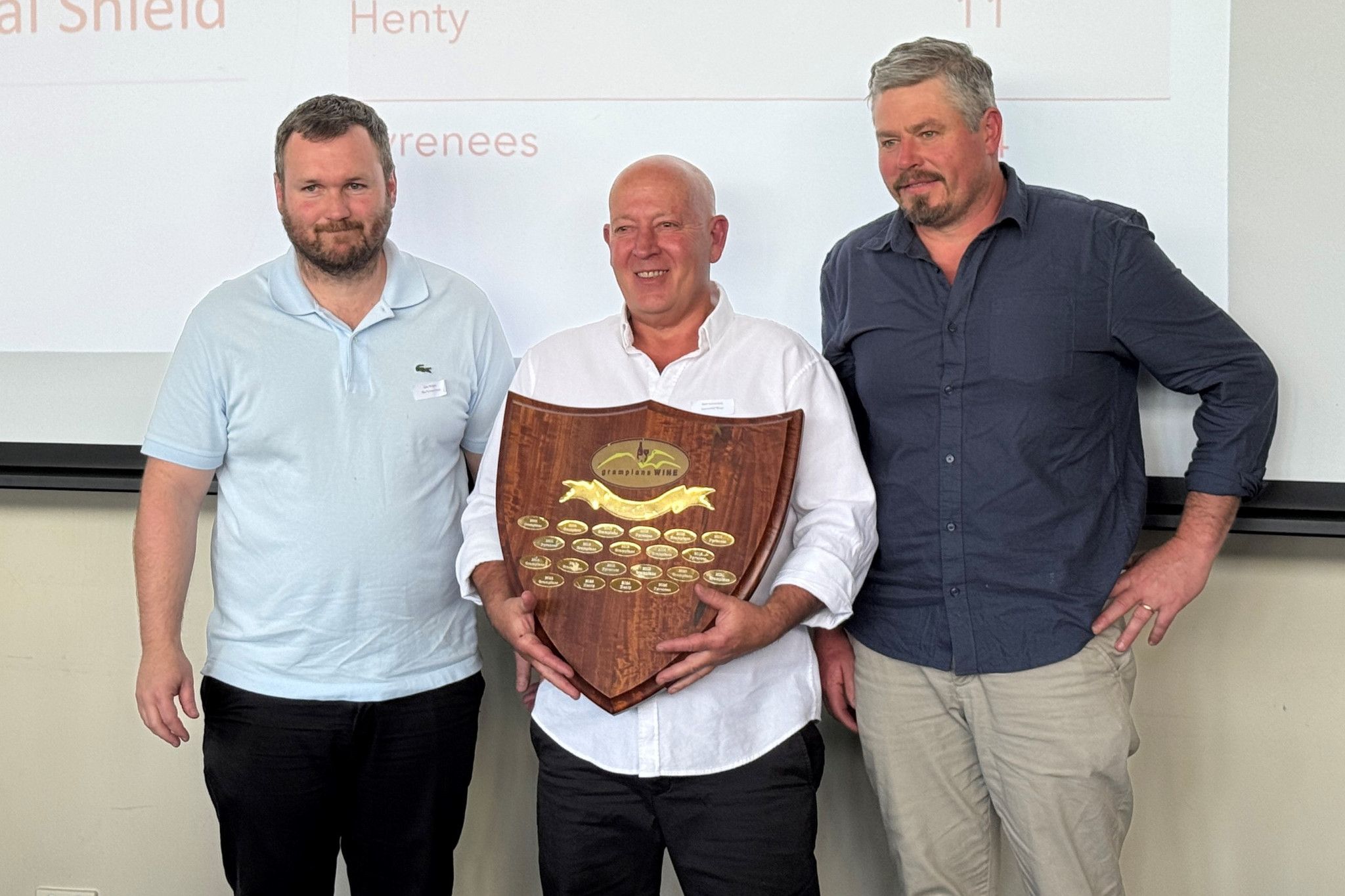 Eden Walpole (Senior Winemaker, Blue Pyrenees Estate), Mark Summerfield (Winemaker & Managing Director, Summerfield Wines), and Ben Howell (Senior Winemaker, Taltarni Vineyards) proudly holding the Western Victorian Wine Challenge Perpetual Trophy for Most Successful Region.