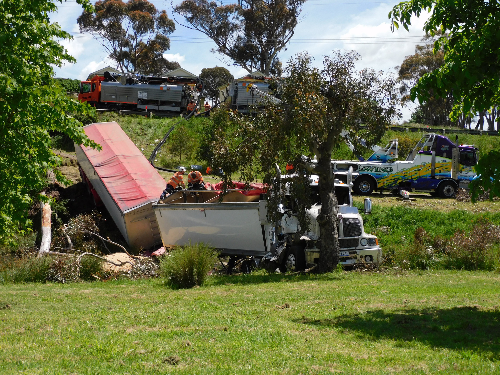 Grain had to be siphoned from the truck before it was removed.