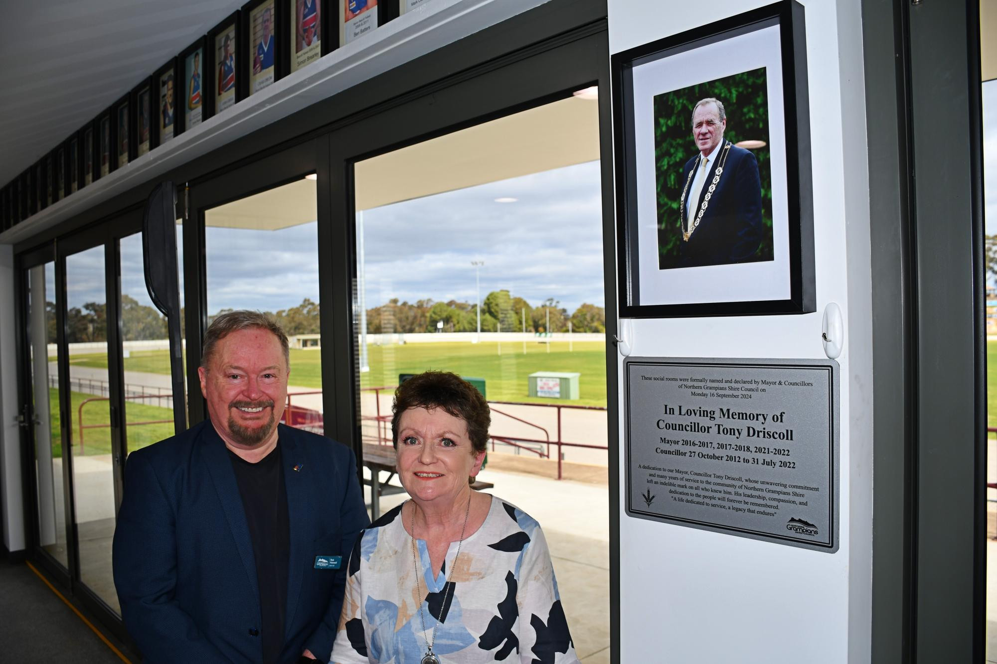 Northern Grampians Shire Council mayor Rob Haswell, left, and Annette Driscoll with the plaque honouring former mayor Tony Driscoll. Picture by Ben Fraser